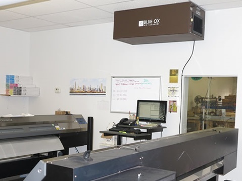 OX1100 commercial air cleaner in a print shop for removing print solvent and fumes