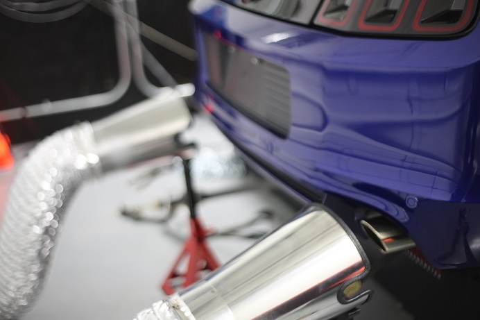 Close up of dyno exhaust removal system and tailpipes.
